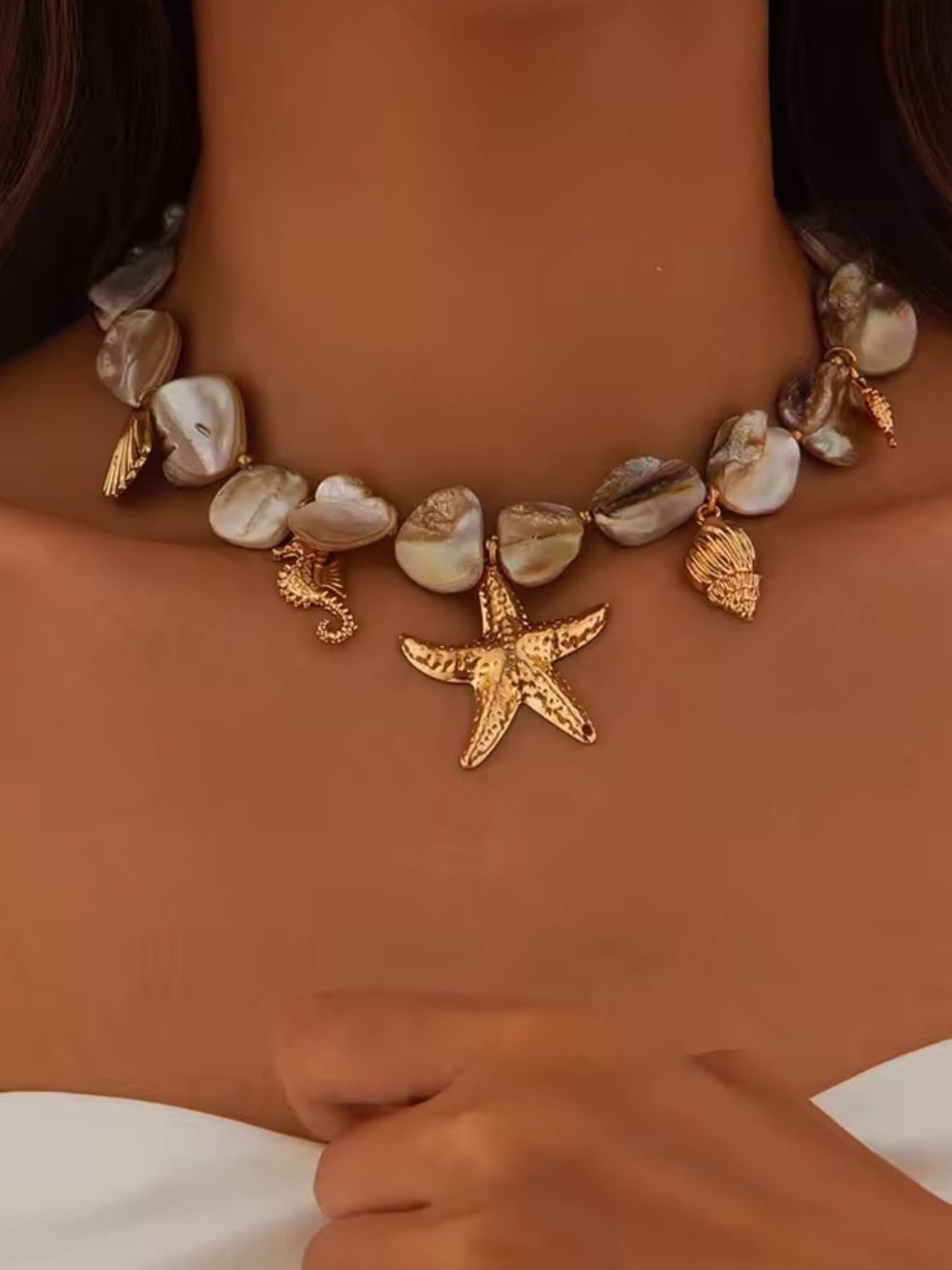 Anthropologie Gold Tone and Pearlescent Shell Starfish Charm Necklace